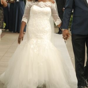 Oleg Cassini Ivory Lace Mermaid Off Shoulder Bridal Gown